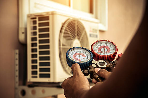 Professional Hvac technician working in Brookville, NY